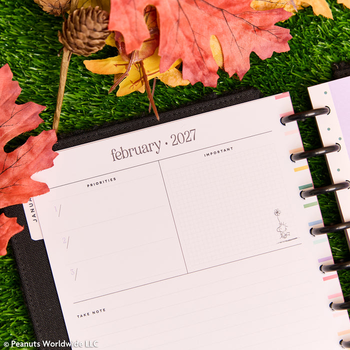 2027 SPECIALTY PEANUTS™ Customizable Planner - Classic Dashboard Layout - 12 Months open to February 2027 dashboard page with priorities and notes, disc binding and autumn leaves