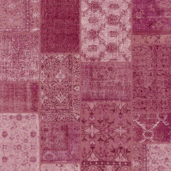 The Berry Patchwork Washable Rug (JRN1040) showcases rectangular and square pink and mauve patterns with unique floral and geometric designs—ideal for allergy-sensitive homes.