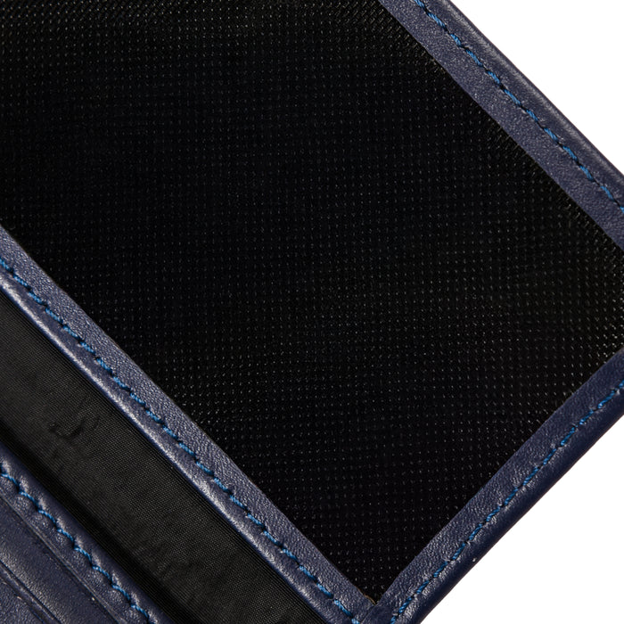Close-up of black and blue leather wallet interior with textured fabric lining