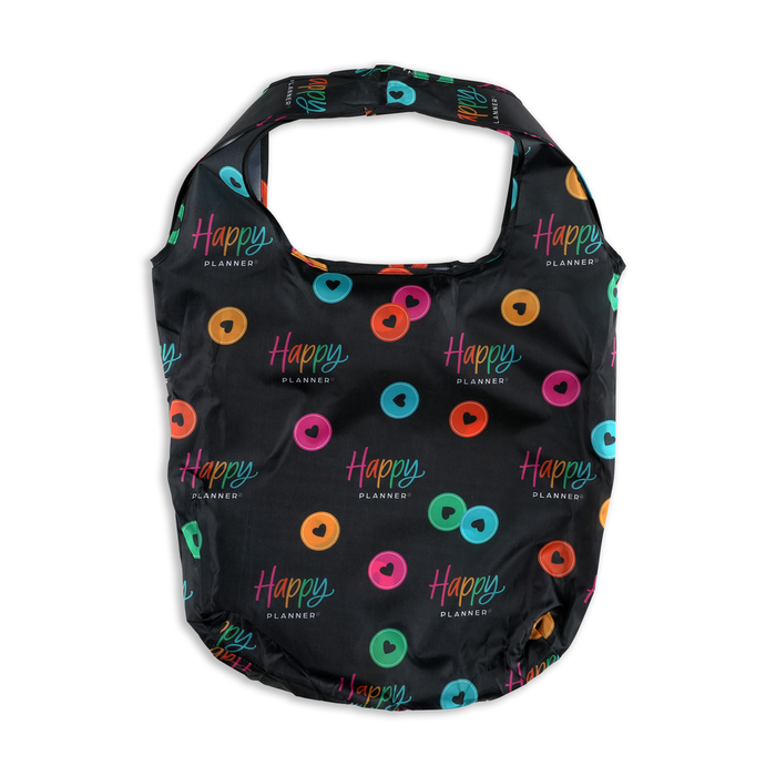 Black reusable shopping tote with colorful heart and disc patterns and the words Happy Planner printed, designed as the Happy Plans - Reusable Shopping Tote.