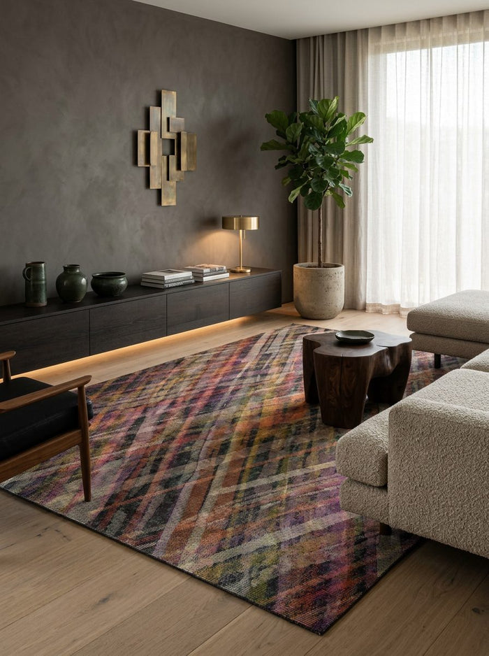 Multicolor abstract plaid rug with intersecting diagonal lines in a modern living room.
