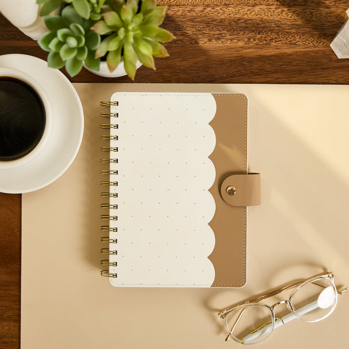 2027 Ivory Delicate Dots Customizable Spiral Citrine Planner - Small Professional Layout - 12 Months on a desk with coffee succulent and eyeglasses