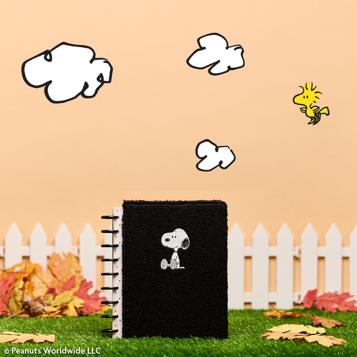 2027 SPECIALTY PEANUTS™ Customizable Planner - Classic Dashboard Layout - 12 Months shown as a black disc bound planner with Snoopy artwork in an autumn outdoor scene