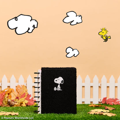 2027 SPECIALTY PEANUTS™ Customizable Planner - Classic Dashboard Layout - 12 Months shown as a black disc bound planner with Snoopy artwork in an autumn outdoor scene