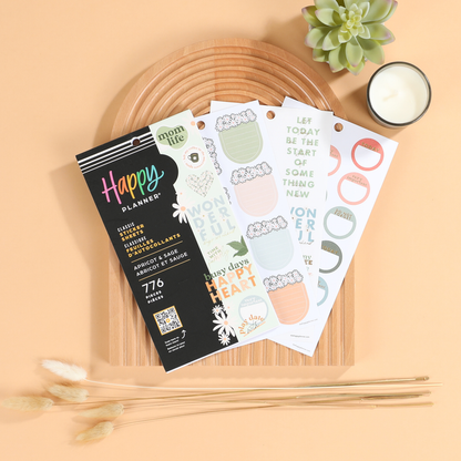 Apricot & Sage Mom - Value Pack Stickers featuring pastel-colored planner stickers with motivational phrases, floral designs, and circular labels for Happy Planner or disc bound planners.