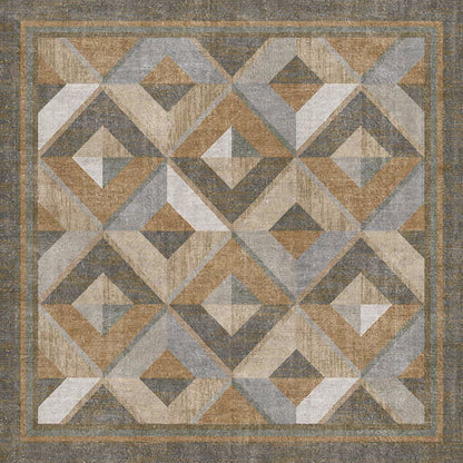 Grey and tan rug with a geometric diamond pattern and a bordered frame.