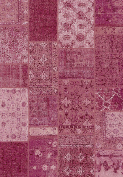 The Berry Patchwork - Washable Rug (JRN1040) showcases intricate vintage-style patterns in pink, magenta, and burgundy. Its rectangular patches feature unique floral and geometric designs—perfect for high-traffic areas.