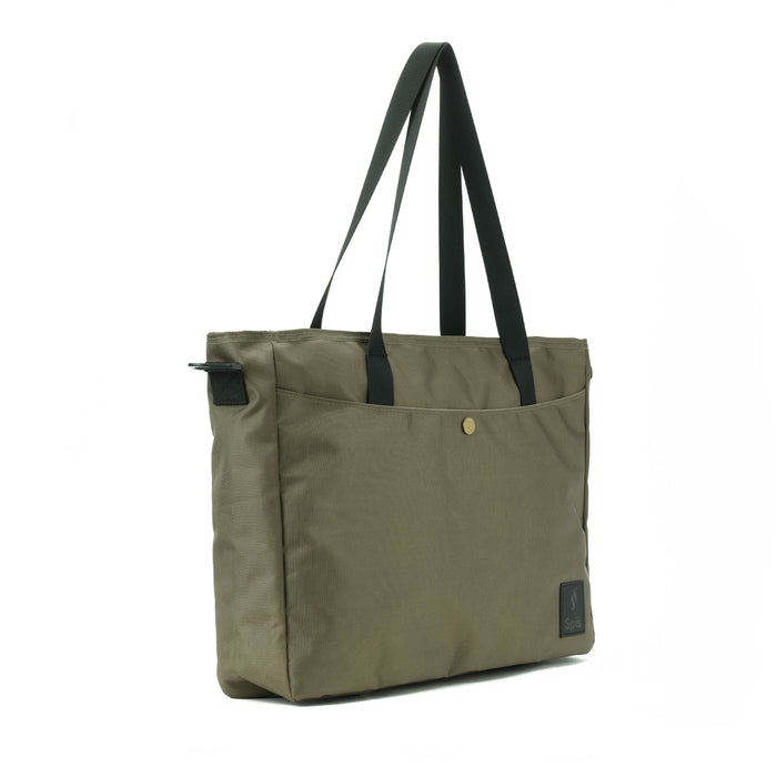 Olive green tote bag with black straps, front pocket, and button detail on white background