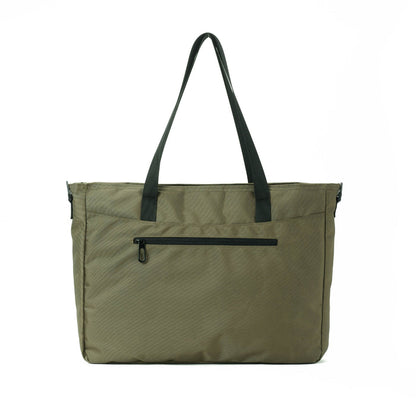 Olive green tote bag with black handles and front zipper pocket on white background