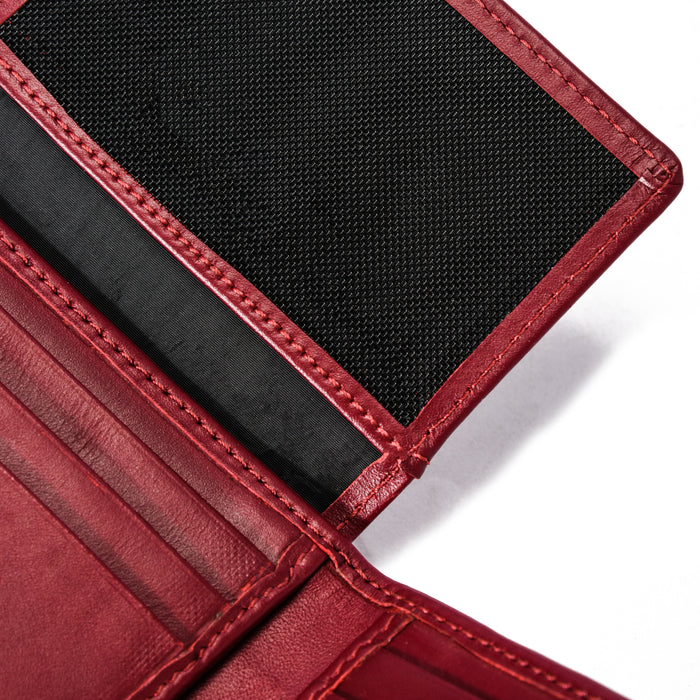 Red leather wallet interior with card slots and black mesh compartment