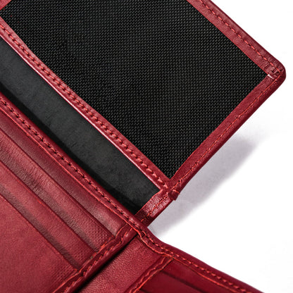 Red leather wallet interior with card slots and black mesh compartment