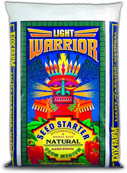 One cubic foot bag of Light Warrior seed starter with vibrant tribal mask graphics and detailed product information.