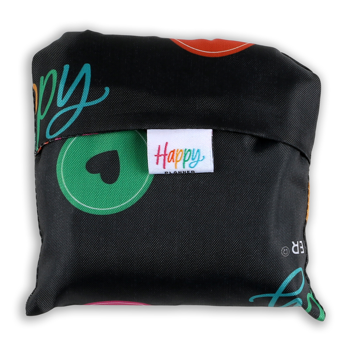 Compact black fabric pouch with colorful Happy Planner logo tag, containing the Happy Plans - Reusable Shopping Tote featuring a cheerful multicolor design.