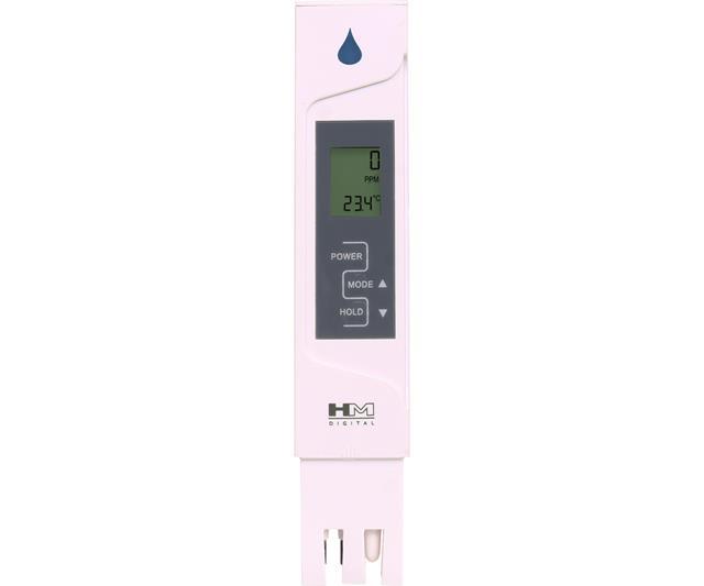 White HM Digital handheld water quality meter showing a digital display with 0 PPM and 23.4°C temperature.