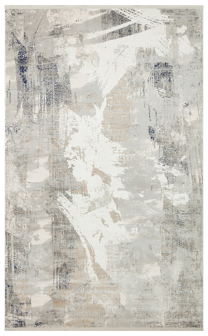 Grey, white, and navy abstract rug with a distressed, brushstroke-inspired pattern.