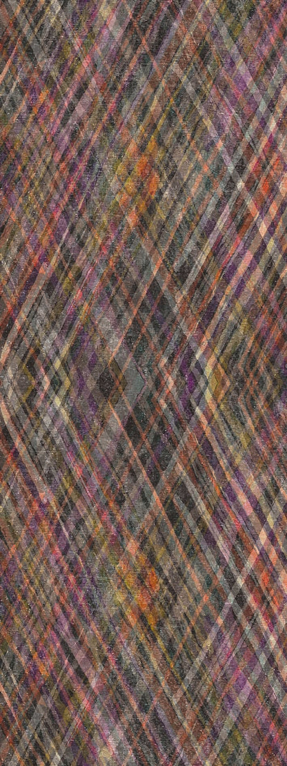 Multi-colored plaid rug with a diagonal diamond pattern in shades of purple, orange, black, and grey.