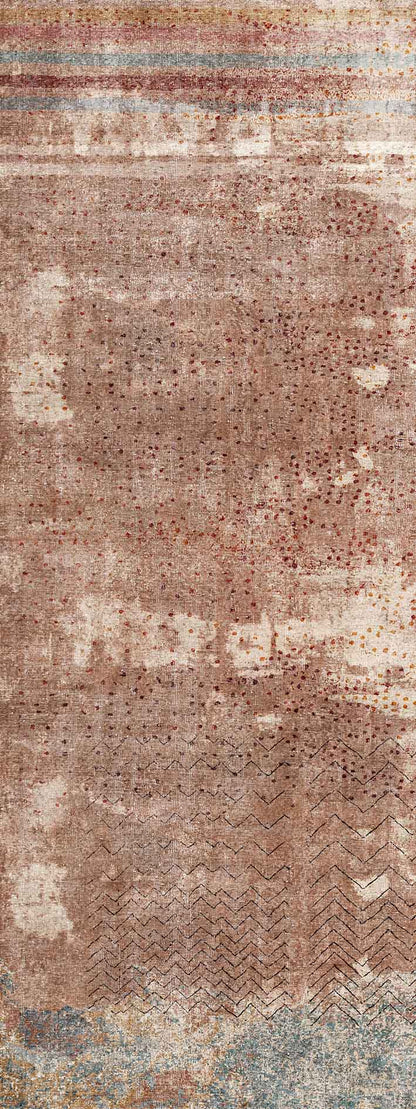 Terracotta rug with a distressed texture, dotted pattern, chevron accents, and horizontal striped borders.