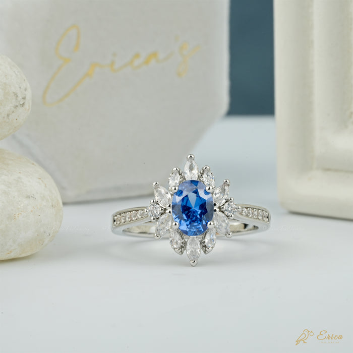 The Ocean - Blue Oval Starburst Lab Grown Diamond Halo Ring
