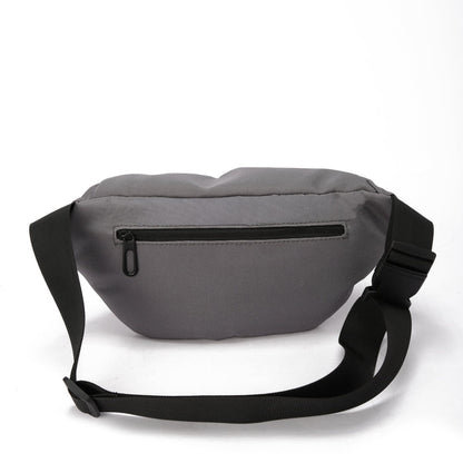Gray sling bag with black adjustable strap and back zipper pocket on white background