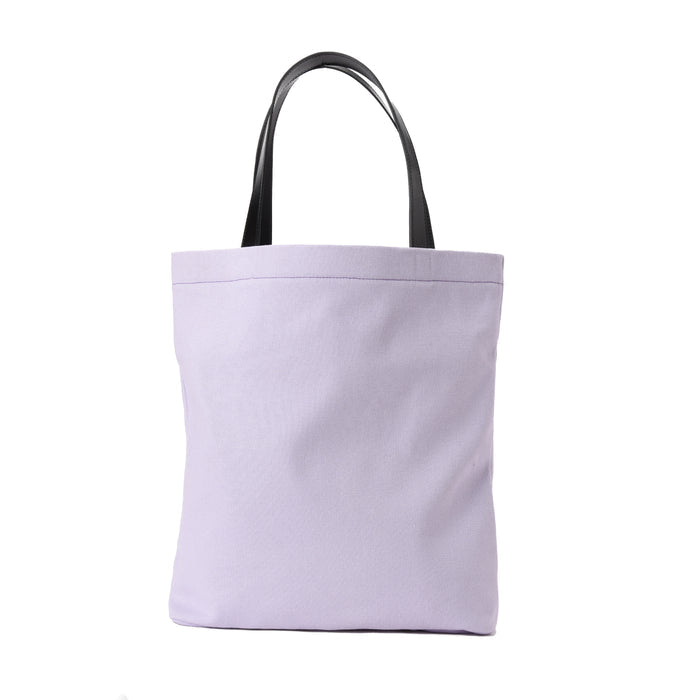 Lavender canvas tote bag with black handles on white background