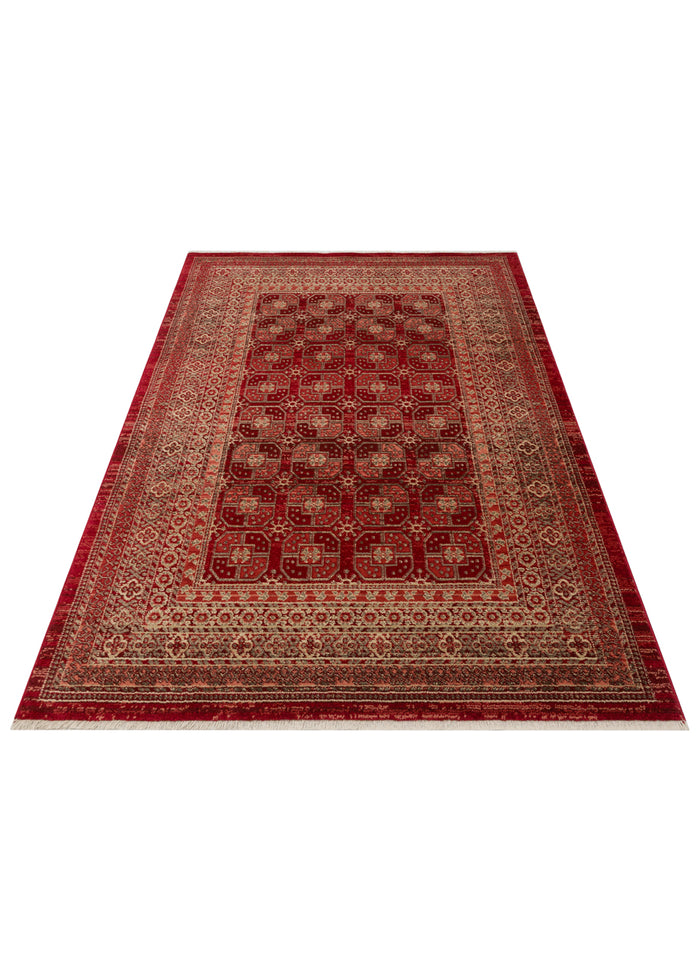 Red and beige traditional rug with a repeating geometric medallion pattern and a decorative border, white background.