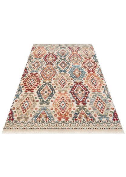 Cream rug with a multi-colored geometric diamond pattern in red, blue, and tan, featuring a fringed border.