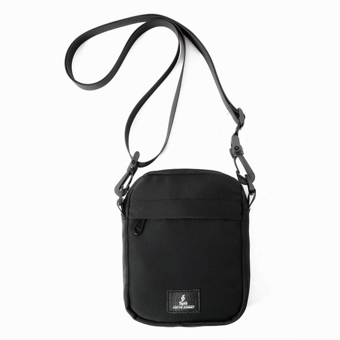 Black cross bag shoulder bag with adjustable strap and front pocket against a white background