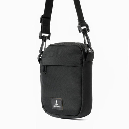 Black cross bag sling bag with adjustable strap and front pocket, minimalist travel style