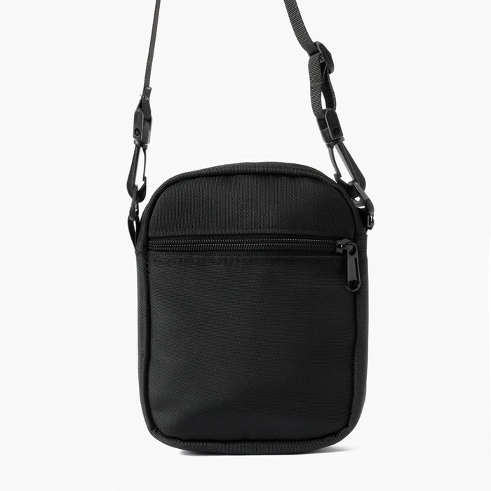 Black cross bag with front zipper pocket and adjustable strap on white background