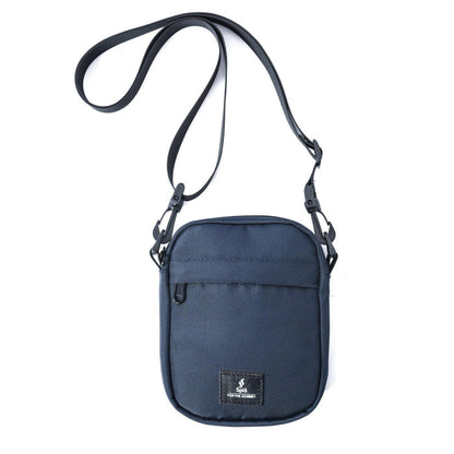 Blue mini cross bag shoulder bag with adjustable strap and front zipper pocket on white background
