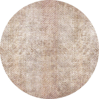 Round beige and tan rug with a distressed herringbone pattern.