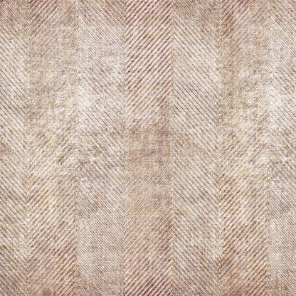 Beige and copper rug with a distressed herringbone pattern and textured finish.